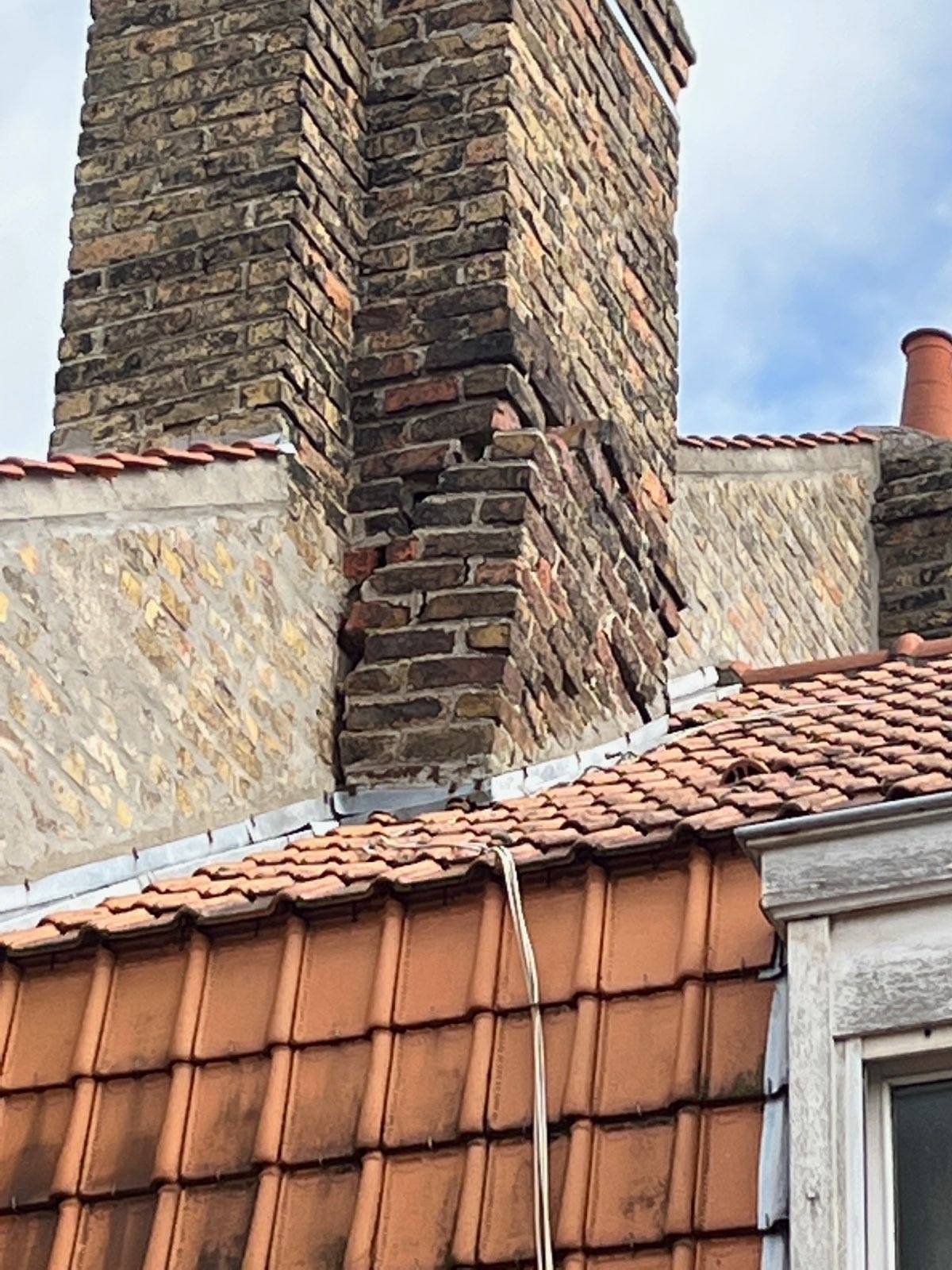 Intervention urgente cheminée Dunkerque – dépose et maçonnerie sécurisée